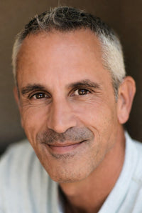 John B.
